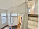 Bright entryway with hardwood floors, neutral walls, and a staircase leading to the upper level at 6063 Peach Orchard Rd, Las Vegas, NV 89142