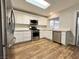 Bright kitchen featuring stainless appliances, modern cabinetry, and light countertops at 6063 Peach Orchard Rd, Las Vegas, NV 89142