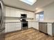 Bright kitchen featuring stainless appliances, modern cabinetry, and light countertops at 6063 Peach Orchard Rd, Las Vegas, NV 89142