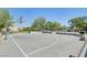 Outdoor basketball court with hoop, surrounded by trees and landscaping at 6283 Lapilli Ave, Las Vegas, NV 89139