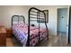 Bedroom with queen bed, closet, and attached bathroom at 6283 Lapilli Ave, Las Vegas, NV 89139