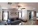 Open-concept living room featuring a ceiling fan, recessed lighting, and seamless flow at 6283 Lapilli Ave, Las Vegas, NV 89139