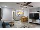 Open living area connecting the kitchen, dining space, and living room in harmony at 6283 Lapilli Ave, Las Vegas, NV 89139