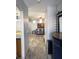 Inviting entryway showcasing an open floor plan, tile flooring, and comfortable living space at 6283 Lapilli Ave, Las Vegas, NV 89139