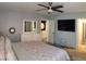 Comfortable main bedroom with light color walls, carpet flooring, and a bay window at 6283 Lapilli Ave, Las Vegas, NV 89139