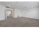 Expansive bonus room with carpet flooring and ample natural light at 629 Soaring Wings Ave, Las Vegas, NV 89183