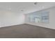 Bonus room with carpet flooring, natural light, and white walls at 629 Soaring Wings Ave, Las Vegas, NV 89183