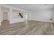Spacious living room with light, wood-look floors and an open layout at 629 Soaring Wings Ave, Las Vegas, NV 89183