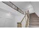 Bright staircase showcasing modern railing design and neutral color palette at 629 Soaring Wings Ave, Las Vegas, NV 89183