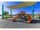 Vibrant playground with slides and climbing structures, shaded for comfortable play on sunny days at 6909 Toll Mountain St, North Las Vegas, NV 89086