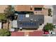 Bird's-eye view of a house with solar panels on the roof, surrounded by green trees at 6924 Senton Ave, Las Vegas, NV 89108