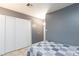 This bedroom is equipped with a spacious closet and tile flooring at 6924 Senton Ave, Las Vegas, NV 89108