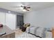 This bedroom offers a ceiling fan, spacious closet, and tile flooring at 6924 Senton Ave, Las Vegas, NV 89108