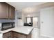 Well-lit kitchen area adjacent to the dining room, offering a functional layout at 6924 Senton Ave, Las Vegas, NV 89108