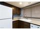 This kitchen has granite countertops and modern appliances at 6924 Senton Ave, Las Vegas, NV 89108