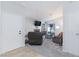 Inviting living room with neutral tones, fireplace, and sliding glass doors to the back patio at 6924 Senton Ave, Las Vegas, NV 89108