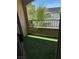 Compact balcony with artificial turf offers a private and relaxing outdoor area at 7885 W Flamingo Rd # 2129, Las Vegas, NV 89147