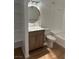 Neat bathroom featuring a modern vanity, toilet and tiled tub with shower at 7885 W Flamingo Rd # 2129, Las Vegas, NV 89147
