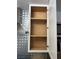Open kitchen cabinet with adjustable shelves at 7885 W Flamingo Rd # 2129, Las Vegas, NV 89147