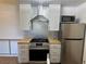 Kitchen features stainless steel appliances, modern cabinets, and ample counter space at 7885 W Flamingo Rd # 2129, Las Vegas, NV 89147
