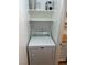 Laundry area with dryer, shelves, and essential hookups for appliances at 7885 W Flamingo Rd # 2129, Las Vegas, NV 89147