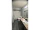 Bathroom featuring a tub/shower combo, granite countertops and modern vanity at 8101 W Flamingo Rd # 2110, Las Vegas, NV 89147
