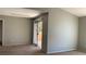 Spacious bedroom features sliding glass doors to private balcony at 8101 W Flamingo Rd # 2110, Las Vegas, NV 89147
