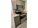 Kitchen featuring gray cabinets and stainless steel range at 8101 W Flamingo Rd # 2110, Las Vegas, NV 89147
