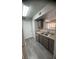 Well-lit kitchen with modern appliances, countertops, and flooring at 8101 W Flamingo Rd # 2110, Las Vegas, NV 89147