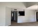 Living room with carpet flooring and access to kitchen, bathroom, and bedroom at 8101 W Flamingo Rd # 2110, Las Vegas, NV 89147