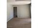 Cozy living room showcasing neutral walls and plush carpeting, creating a welcoming atmosphere at 8101 W Flamingo Rd # 2110, Las Vegas, NV 89147