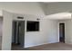 Open living space with a breakfast bar, neutral tones, and easy access to the kitchen area at 8101 W Flamingo Rd # 2110, Las Vegas, NV 89147