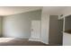 The living room offers multiple electrical outlets and carpet flooring, with access to the dining area at 8101 W Flamingo Rd # 2110, Las Vegas, NV 89147