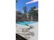 Community pool with clear water and lounge chairs at 8101 W Flamingo Rd # 2110, Las Vegas, NV 89147