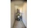 Water heater with plumbing inside a utility closet at 8101 W Flamingo Rd # 2110, Las Vegas, NV 89147