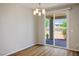 Bright dining area with sliding glass doors leading to the outdoor patio at 9136 Cocowoods Pl, Las Vegas, NV 89148