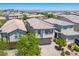 Desirable two-story home with attractive desert landscaping and a pristine exterior at 9136 Cocowoods Pl, Las Vegas, NV 89148