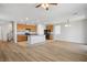 Bright and spacious kitchen open to the living area, featuring a large island and ample cabinet space at 9136 Cocowoods Pl, Las Vegas, NV 89148