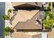 Aerial view showcases the home's private backyard, landscaped yard, and shaded pergola at 1004 Viale Placenza Pl, Henderson, NV 89011