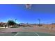 Outdoor basketball court with playground and mountain views, perfect for recreation and community fun at 1004 Viale Placenza Pl, Henderson, NV 89011