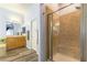 This bathroom offers a tiled walk-in shower with a built-in bench at 1004 Viale Placenza Pl, Henderson, NV 89011