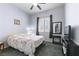 Bedroom features a large window, a ceiling fan, and ample space at 1004 Viale Placenza Pl, Henderson, NV 89011