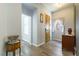 The foyer features beautiful hardwood floors and leads to the living areas at 1004 Viale Placenza Pl, Henderson, NV 89011