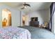Spacious main bedroom with backyard access, a walk-in closet, and an ensuite bathroom at 1004 Viale Placenza Pl, Henderson, NV 89011