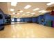 Bright fitness studio with mirrored wall, exercise equipment, and ample space for group activities at 1004 Viale Placenza Pl, Henderson, NV 89011
