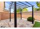 The backyard includes a pergola, artificial grass, and a paver patio at 10557 Bandera Mountain Ln, Las Vegas, NV 89166