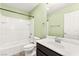 Bathroom with a tub, sink, mirror and tile flooring at 10557 Bandera Mountain Ln, Las Vegas, NV 89166