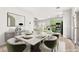 Inviting dining area boasts modern furnishings and ample natural light at 10557 Bandera Mountain Ln, Las Vegas, NV 89166