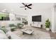 Bright living room features stylish decor and comfortable seating at 10557 Bandera Mountain Ln, Las Vegas, NV 89166