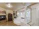 Spacious bathroom features a jetted tub, a fireplace, and decorative columns around a bay window at 11241 Pentland Downs St, Las Vegas, NV 89141
